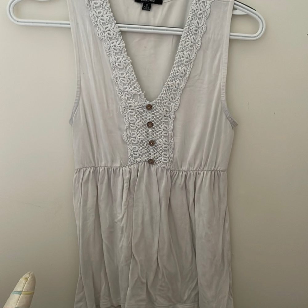 White sleeveless shirt